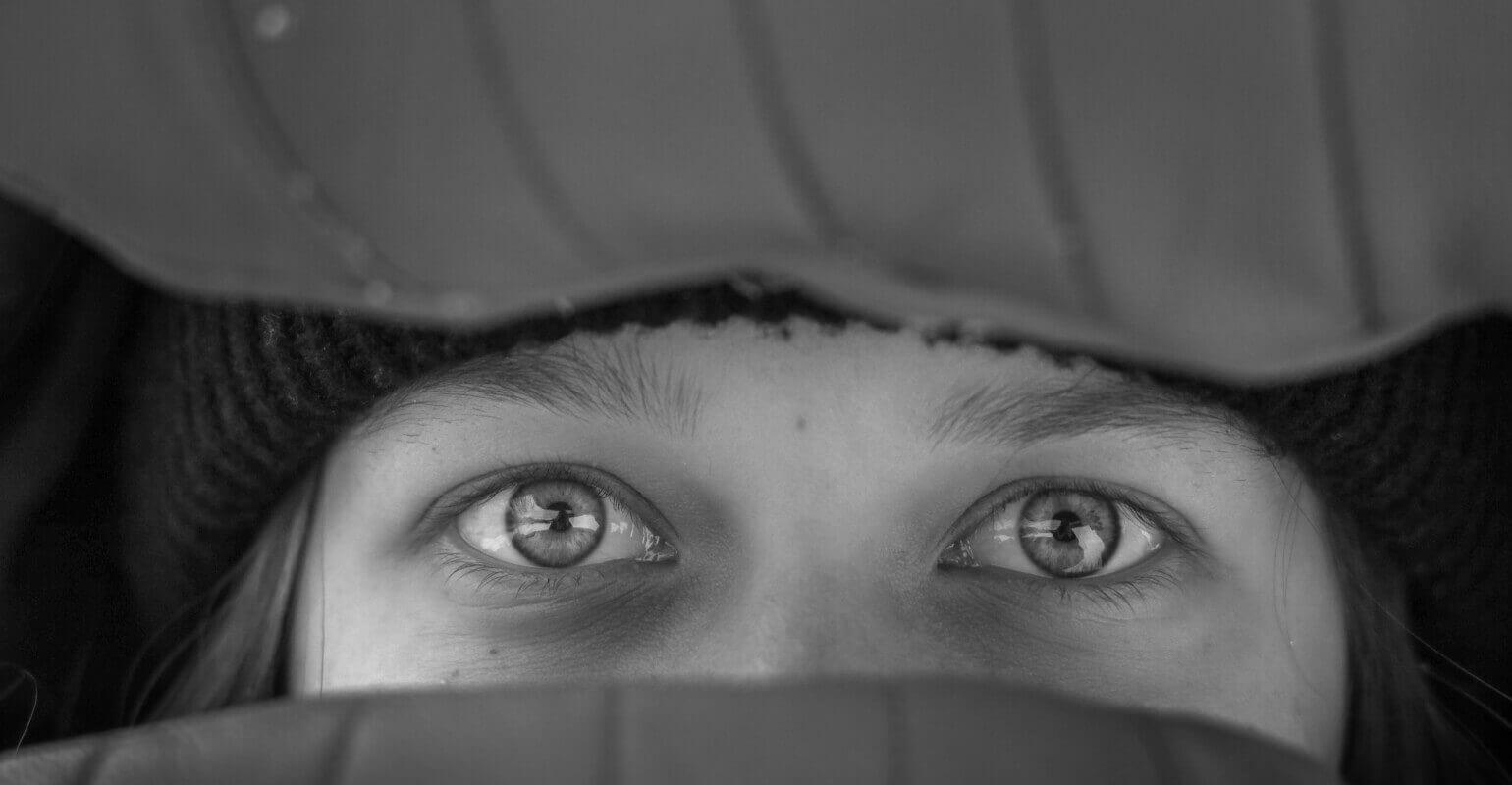 Grayscale photo of a womans eyes